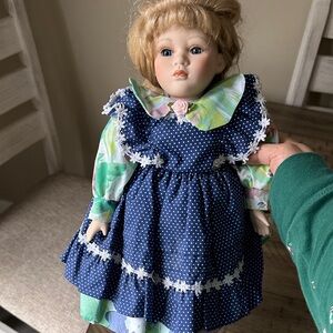 Charming Navy Polka Dot Doll with Floral Accents